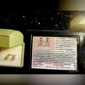 .5 (.25 carat each earring) carat diamond platinum earrings.